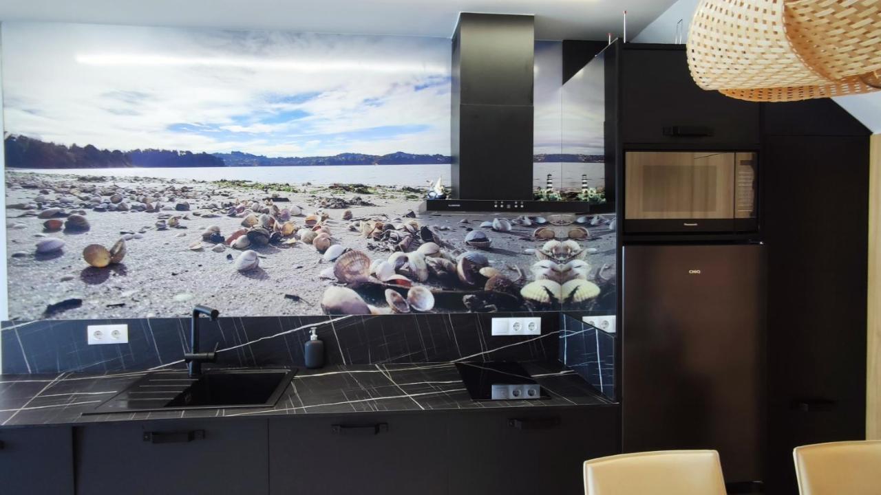Suite Playa Mino Bagian luar foto